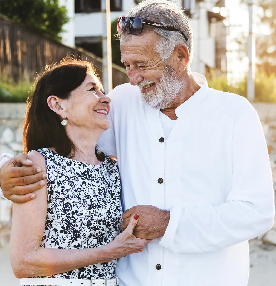 portrait of senior couple on the beach understanding annuities